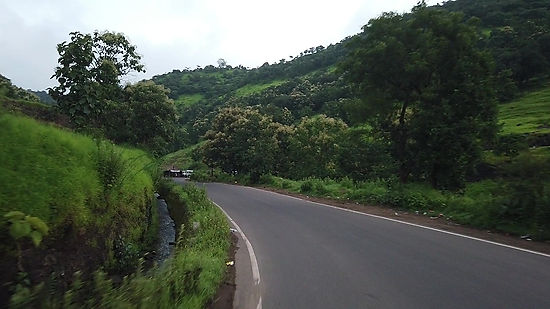 Traveling by CAR on Hilly Curvy Road to the Bhimashankar Mahadev in the Morning at Maharashtra